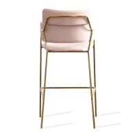 Hoher gepolsterter Hocker mit goldenen Beinen